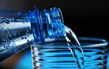 Sparkling water being poured into a glass